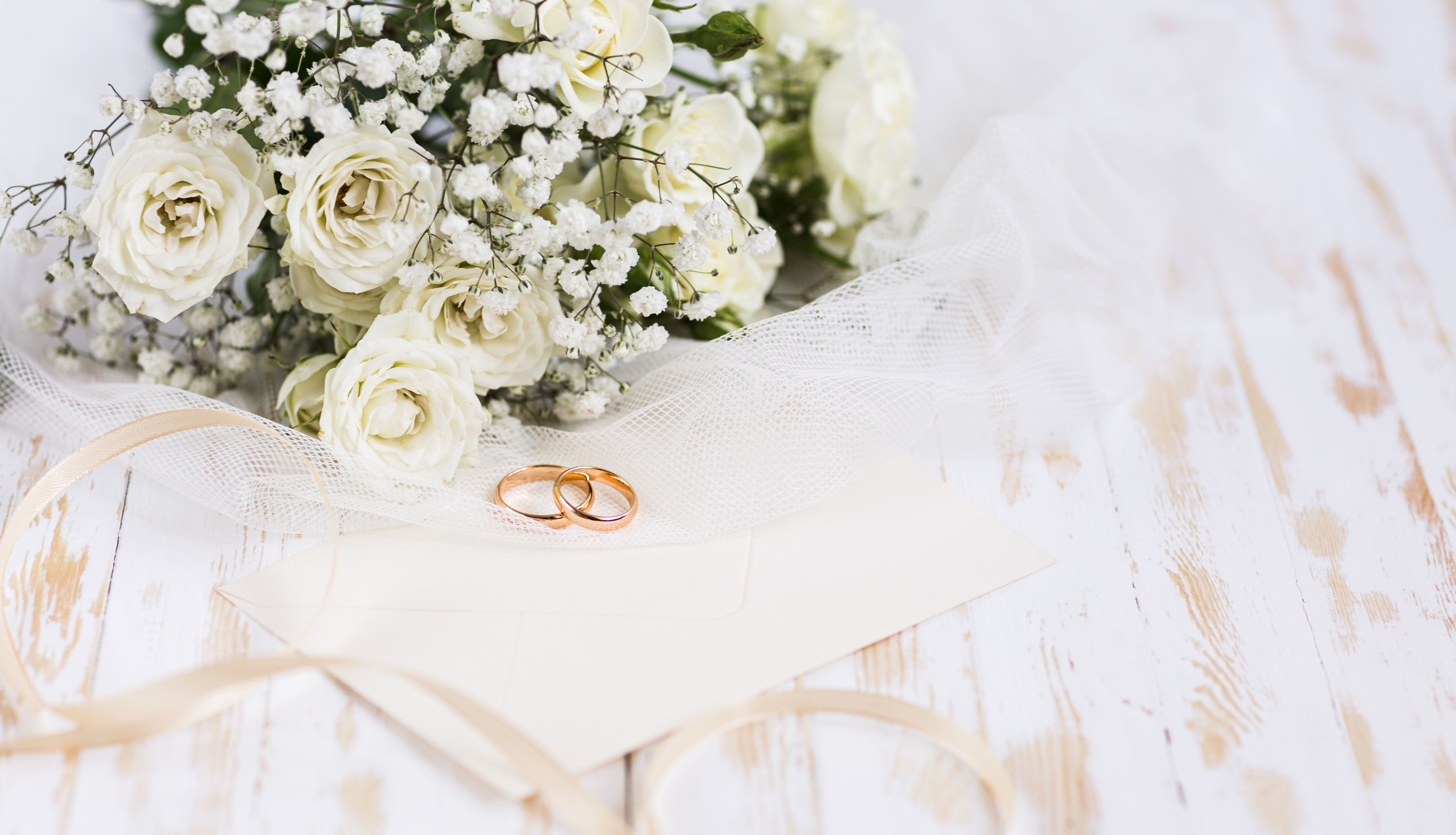 wedding flowers and two wedding rings