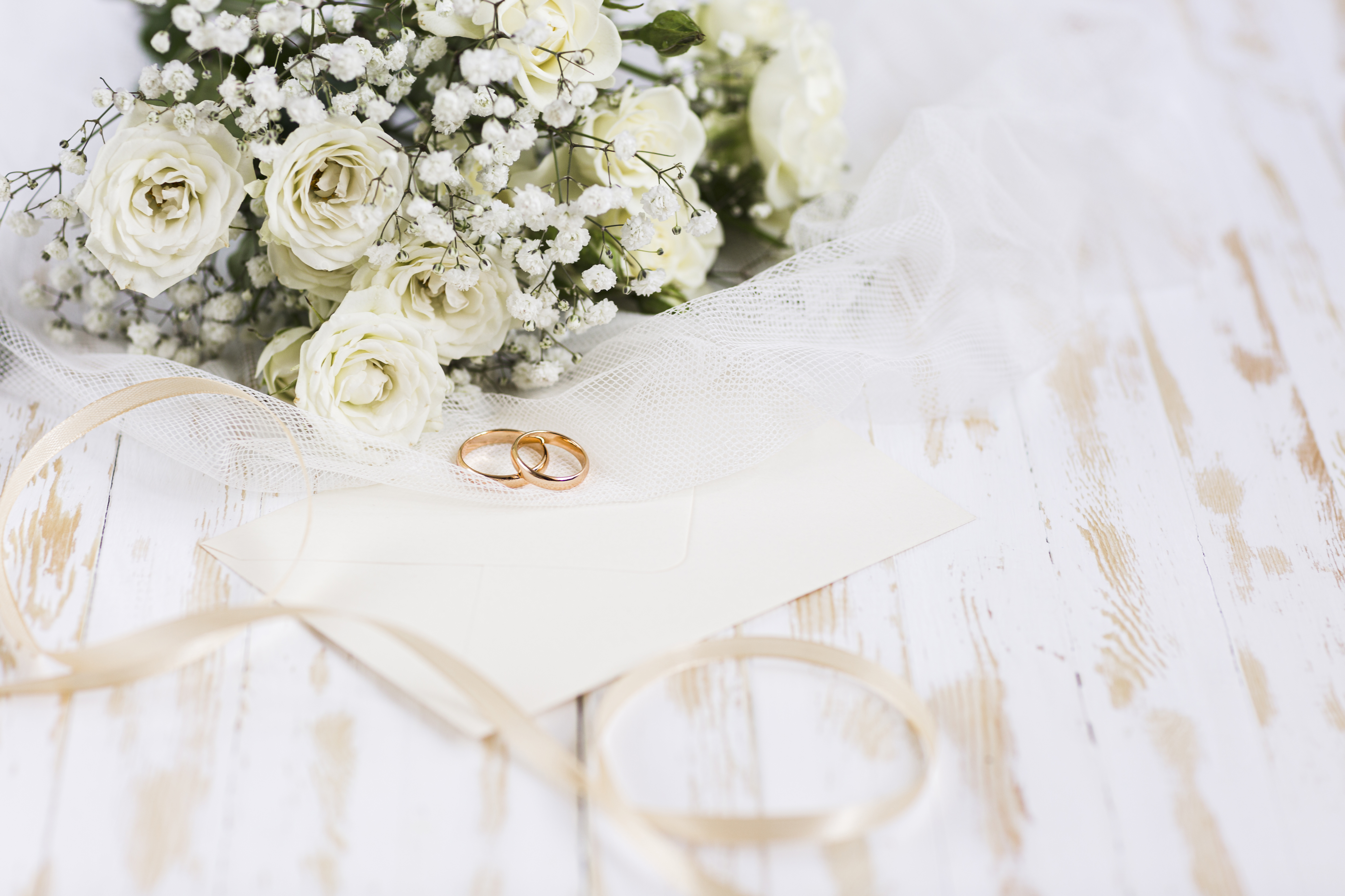 wedding flowers and two wedding rings